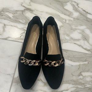Black low heel loafers. Worn once. Excellent condition.